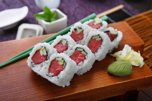 Philadelphia maki sushi with salmon, prawn, avocado, cream cheese. Sushi roll menu.  Isolated on white background. Top view