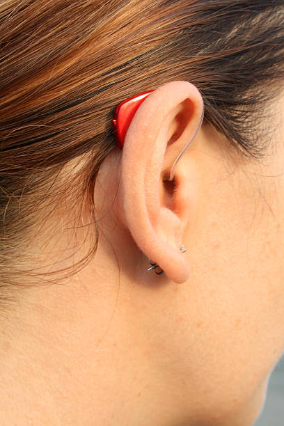 istock Woman with Hearing Aid 157610304