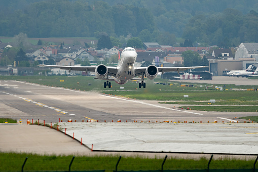 Zurich, Switzerland, May 2, 2023 HB-AZF Helvetic Airways Embraer E190-E2 aircraft departing from runway 28