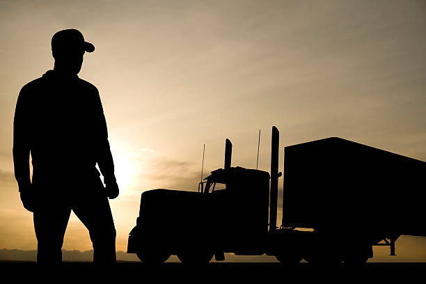 トラック運転手と彼の掘削装置 - oil distribution ストックフォトと画像