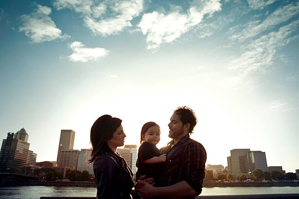 Young Hispanic Family and Child Silhouette