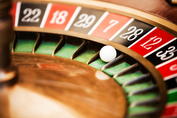 Roulette Roulette wheel in casino, close-up on No. 28. roulette photos stock pictures, royalty-free photos & images