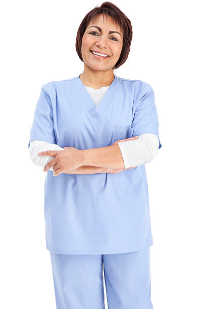 Hispanic Nurse in Blue Scrubs  female nurse photos stock pictures, royalty-free photos & images
