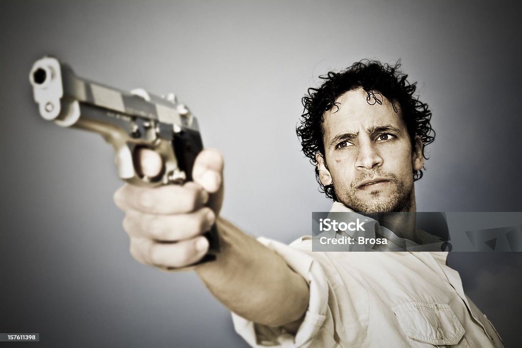 Homem com arma - Foto de stock de Fotografia - Imagem royalty-free