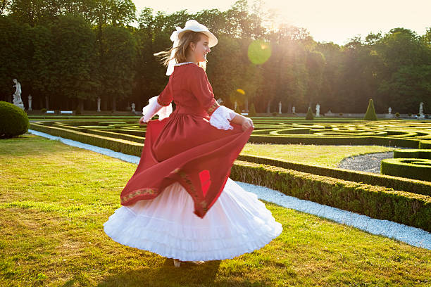 istock young lady in front of baroque garden 157611592