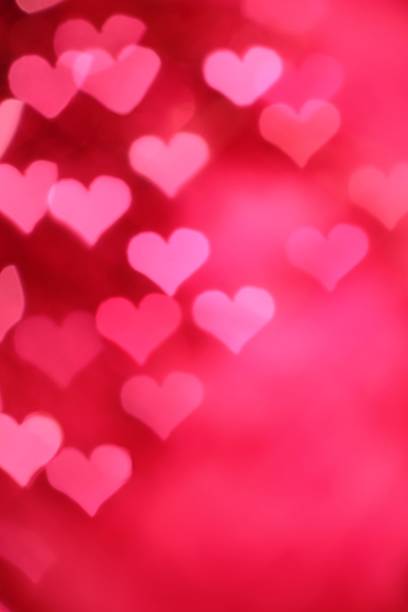 A background of a pink hearts design stock photo