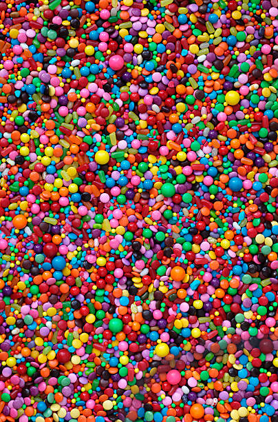 Background filled with assorted colorful candy stock photo