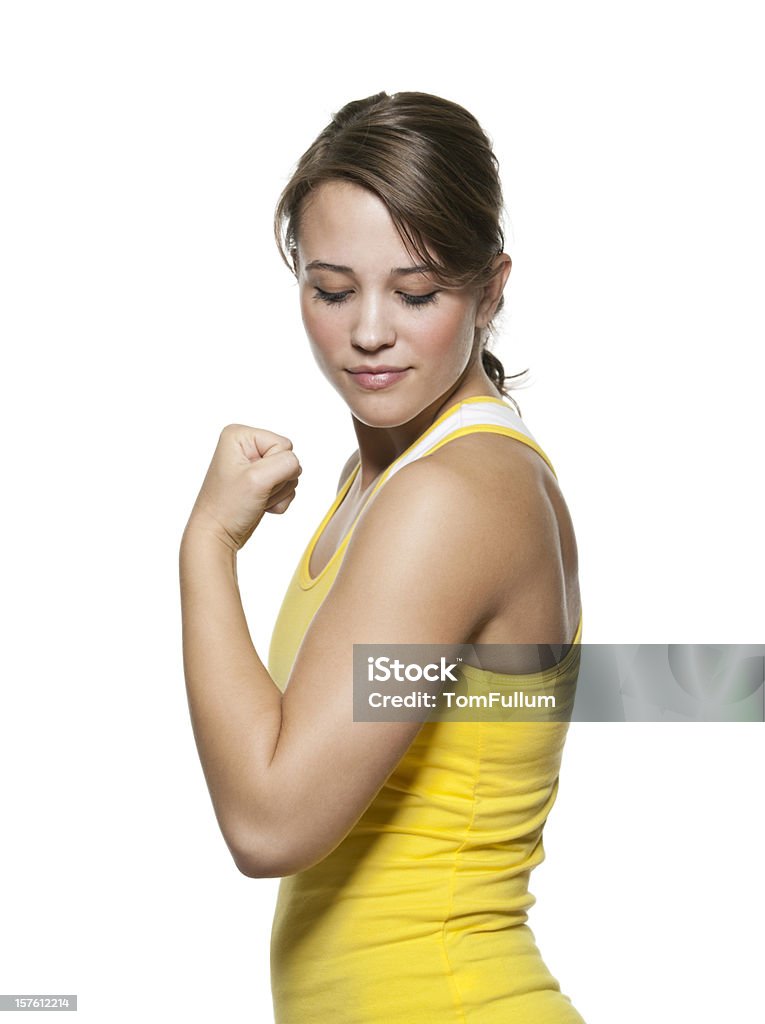 Saudável Jovem mulher admirando seu bíceps músculos - Foto de stock de Bíceps royalty-free