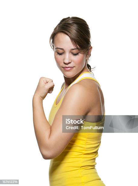 Foto de Saudável Jovem Mulher Admirando Seu Bíceps Músculos e mais fotos de stock de Bíceps