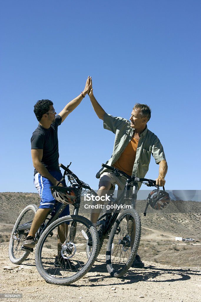 Vater und Sohn Mountainbiken - Lizenzfrei Vater Stock-Foto