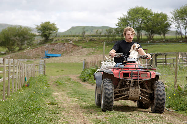 istock Handsome young man on quad bike 157612651