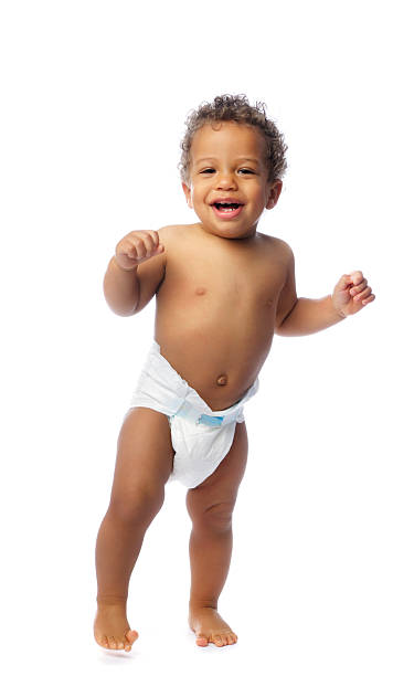 istock Happy Baby Smiling and Walking While Looking At The Camera 157612920