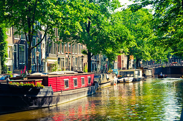 Canal boats in Amsterdam  jordaan amsterdam stock pictures, royalty-free photos & images
