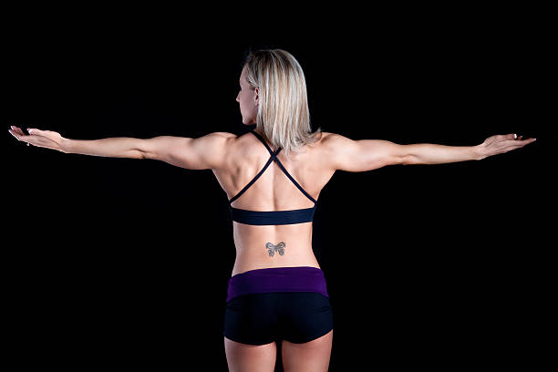 美しい雌 bodybuilder シリーズ - tattoo women back rear view ストックフォトと画像