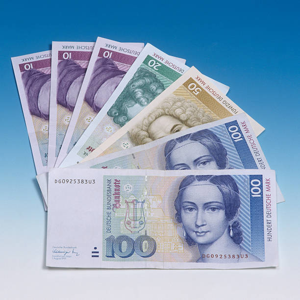 OLD german mark bills in a row The old german currency in 100, 50, 20 and 10 Deutsche Mark bills german currency stock pictures, royalty-free photos & images