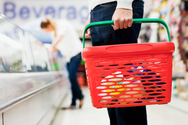 istock Man Holding Grocery Basket 157613291