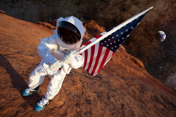 istock Astronaut on Mars With An American Flag 157613345