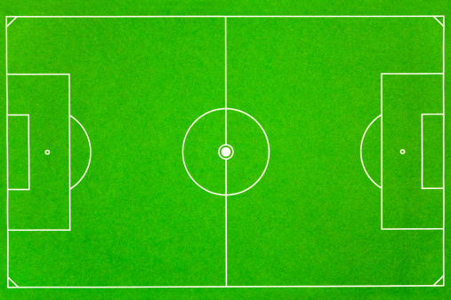 full frame soccer field viewed directly from above. It's a felt textile. Took me really long time to get this. Espacially to get the angles so perfectly in the frame... Make your strategy with a defence, midfield and forward.  See also this RELATED images: