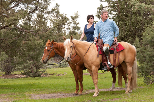 istock Horseback riders/amputee 157613881