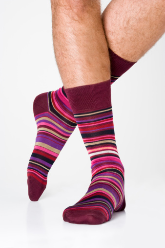 Man wearing striped socks, close up