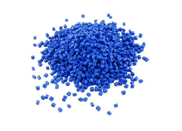 Stack of blue polymer granules stock photo