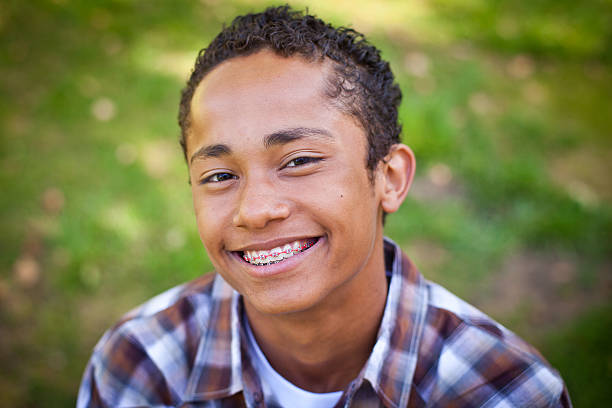 Young Male Teen Young Male Teen smiling at camera. Also see... braces stock pictures, royalty-free photos & images