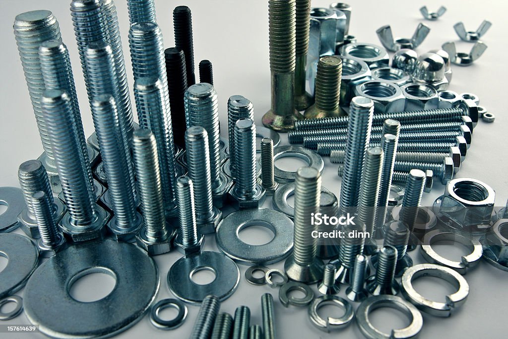 Mechanical city - constructional still life Bolts and nuts composed as a city with mechanical skyscrapers, financial district and infrastructure. Close-up shot. Bolt - Fastener Stock Photo