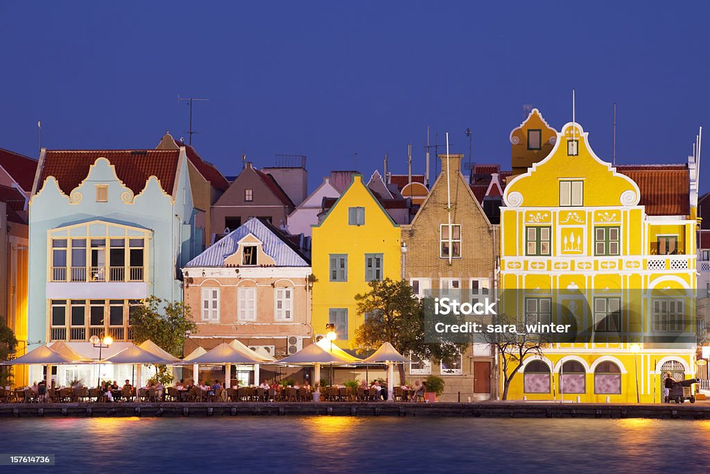 Colorful houses of Willemstad, Curaçao at night The coloured houses of Willemstad, Curaçao in the Netherlands Antilles by night. Curaçao Stock Photo
