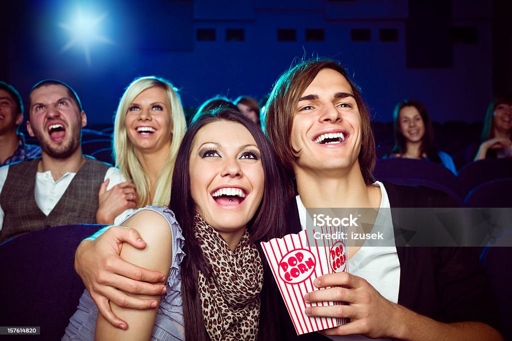 Date in movie theater Young adult couples sitting in the cinema   Adult Stock Photo