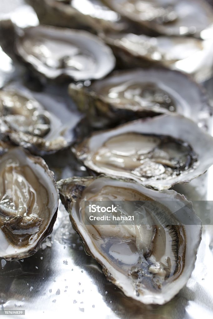 Un demi-coquille des huîtres - Photo de Aliment libre de droits