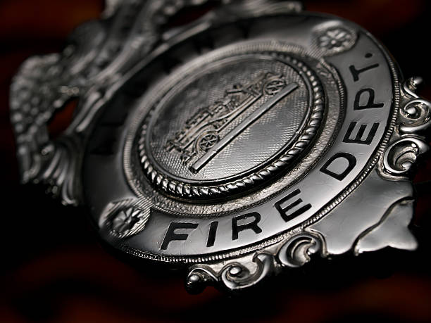istock Fire Deptartment Fireman Firefighter firemen metal Badge Silver 157614889