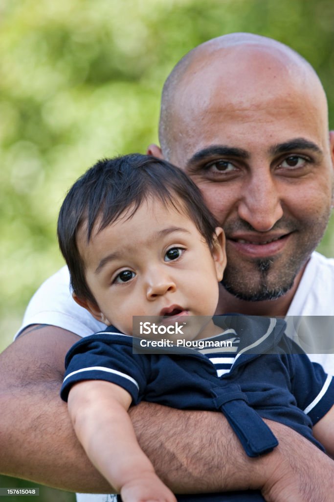 Baby and father Iraq Stock Photo