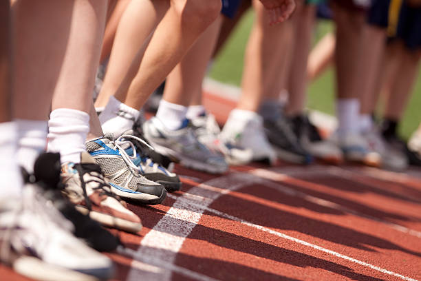 istock Boys lined at starting line for running race 157615112