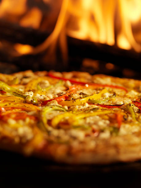 istock Pizza in a Wood Burning oven 157615283