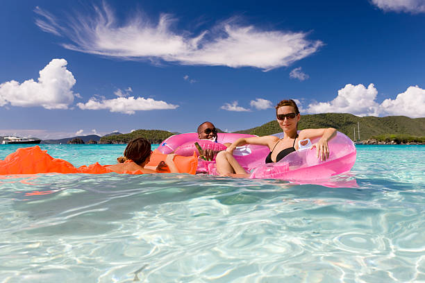 istock vacation friends floating on rafts in the Caribbean 157615336
