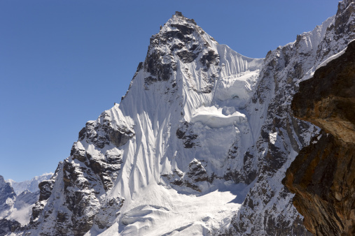 France, Chamonix Mont-Blanc - April 10, 2022: A pathway to the ice cave at Mer de Glace Glacier, Chamonix, France