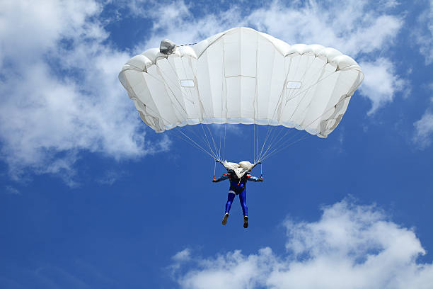 Parachutist in air