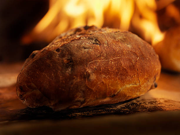 istock Cranberry Sourdough Bread in a Wood Burning oven 157616027