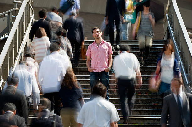 standing out - escaping the rat race imagens e fotografias de stock