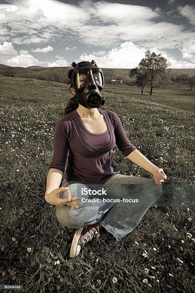 Pollution Meditating in polluted rural scene. Nuclear Energy Stock Photo