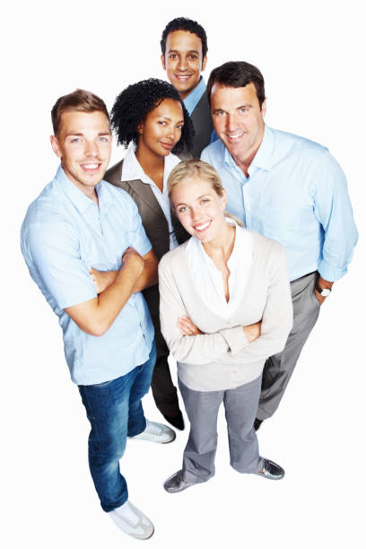 istock Smiling business people standing against white 157616854