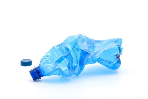 top view of empty blue plastic bottle