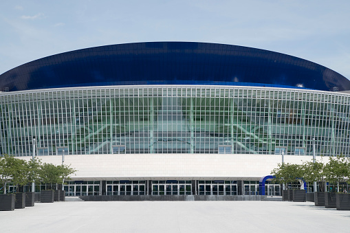 Abu Dhabi, United Arab Emirates - December 11, 2013: Ferrari World building details with roller coaster.