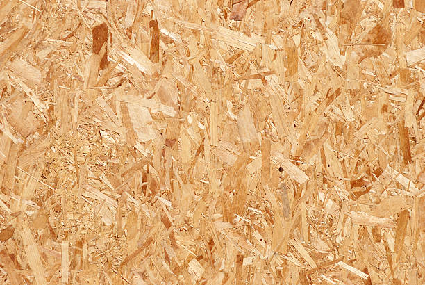 Pressed wood background Pressed wood background plywood stock pictures, royalty-free photos & images