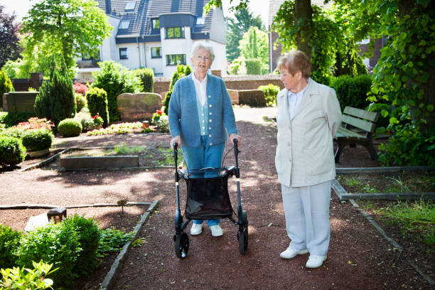 istock senior women on a cemetary 157617560