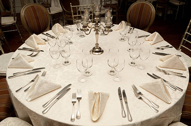 Elegant circular dining table with ten places set