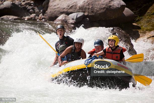 Whitewater Rafting Through Rapids Stock Photo - Download Image Now - White Water Rafting, Rafting, Teamwork