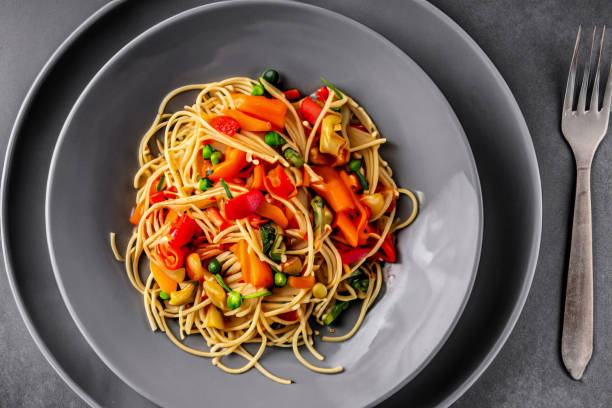 istock African traditional Spaghetti pasta with vegetable and sauce 1576177402