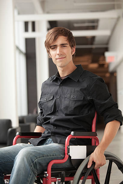 istock Young Man In Wheelchair 157617843