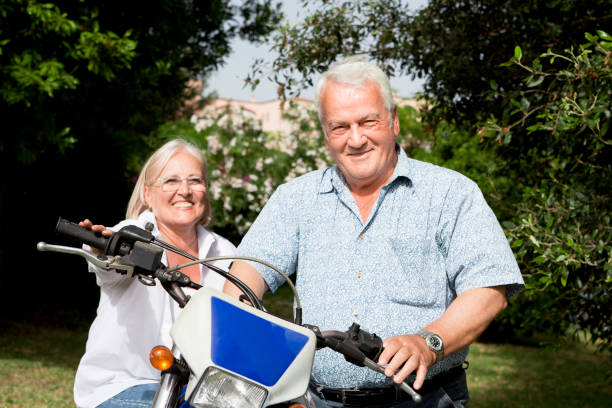 istock Elder couple on motorcycle ride 157617915